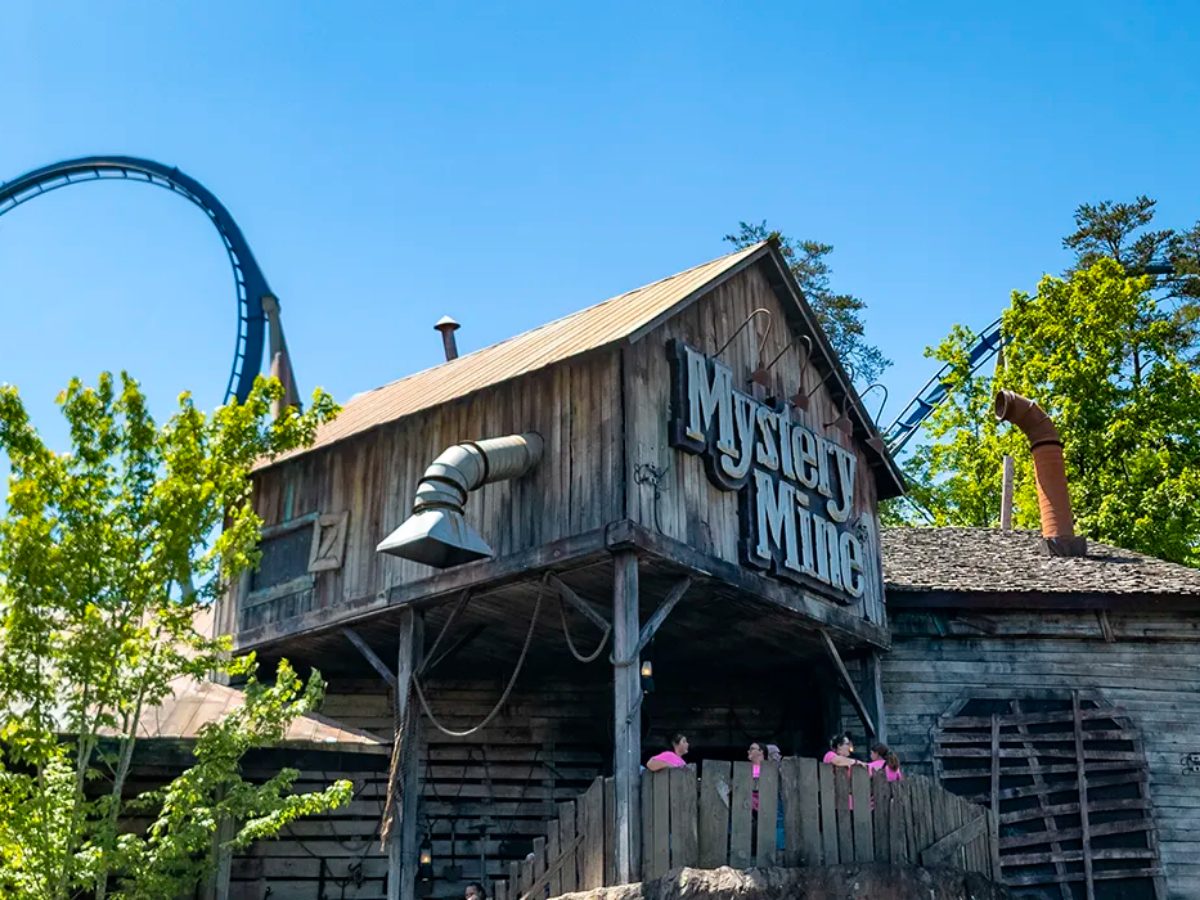Wooden roller coaster and treetops at Dollywood